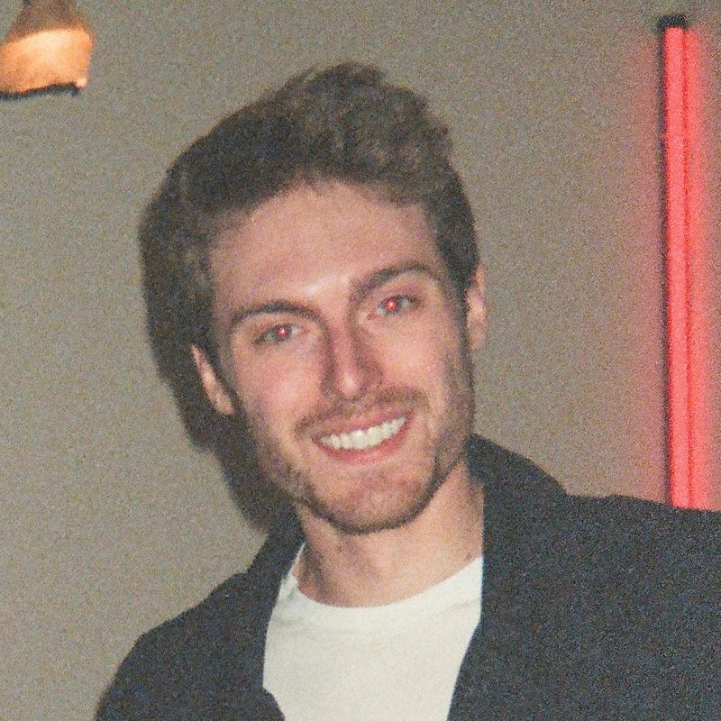 Jack Fox Baum smiling at a venue after a performance